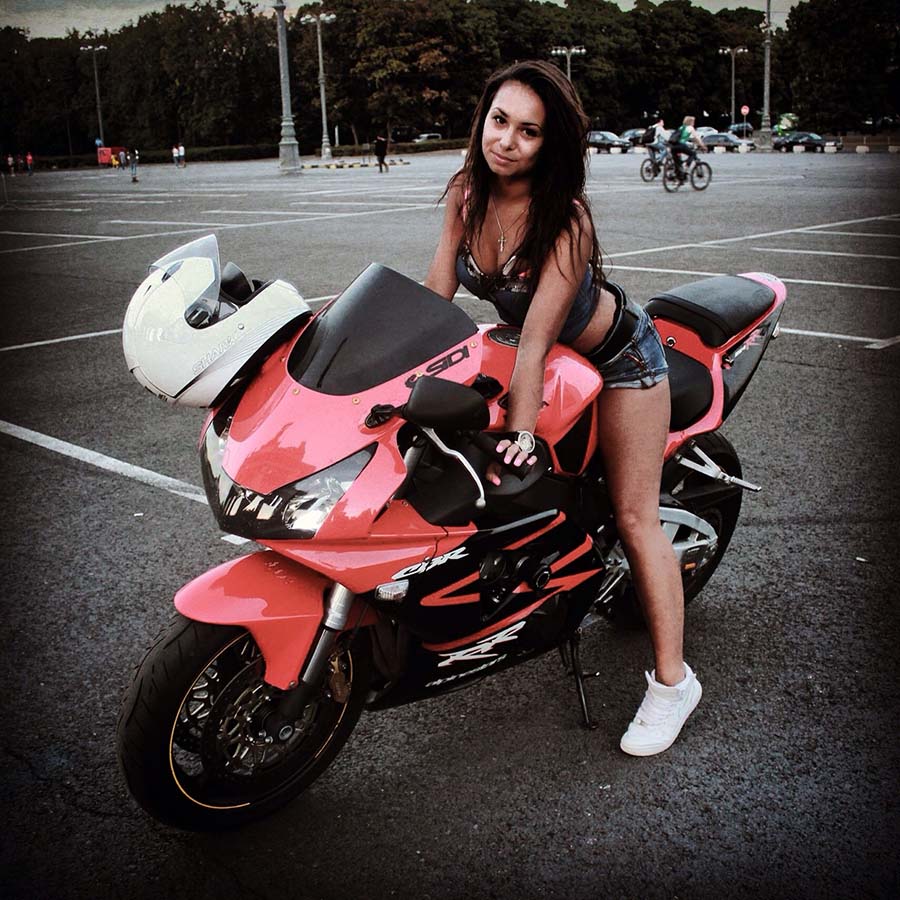 Brunettes on a motorcycle in Zaporozhye